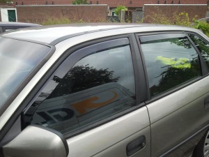 Opel Astra zijwindschermen visors raamgeleiders heko
