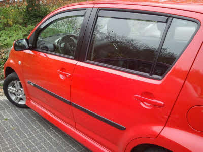 Subaru Justy zijwindschermen visors raamspoilers heko